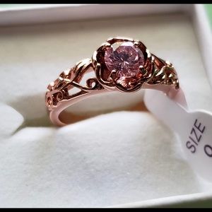Pink and rose gold ring